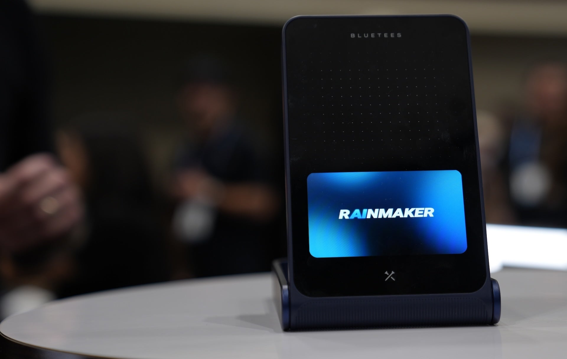 Blue Tees Rainmaker golf launch monitor with the Rainmaker logo on the screen at the 2026 PGA Show