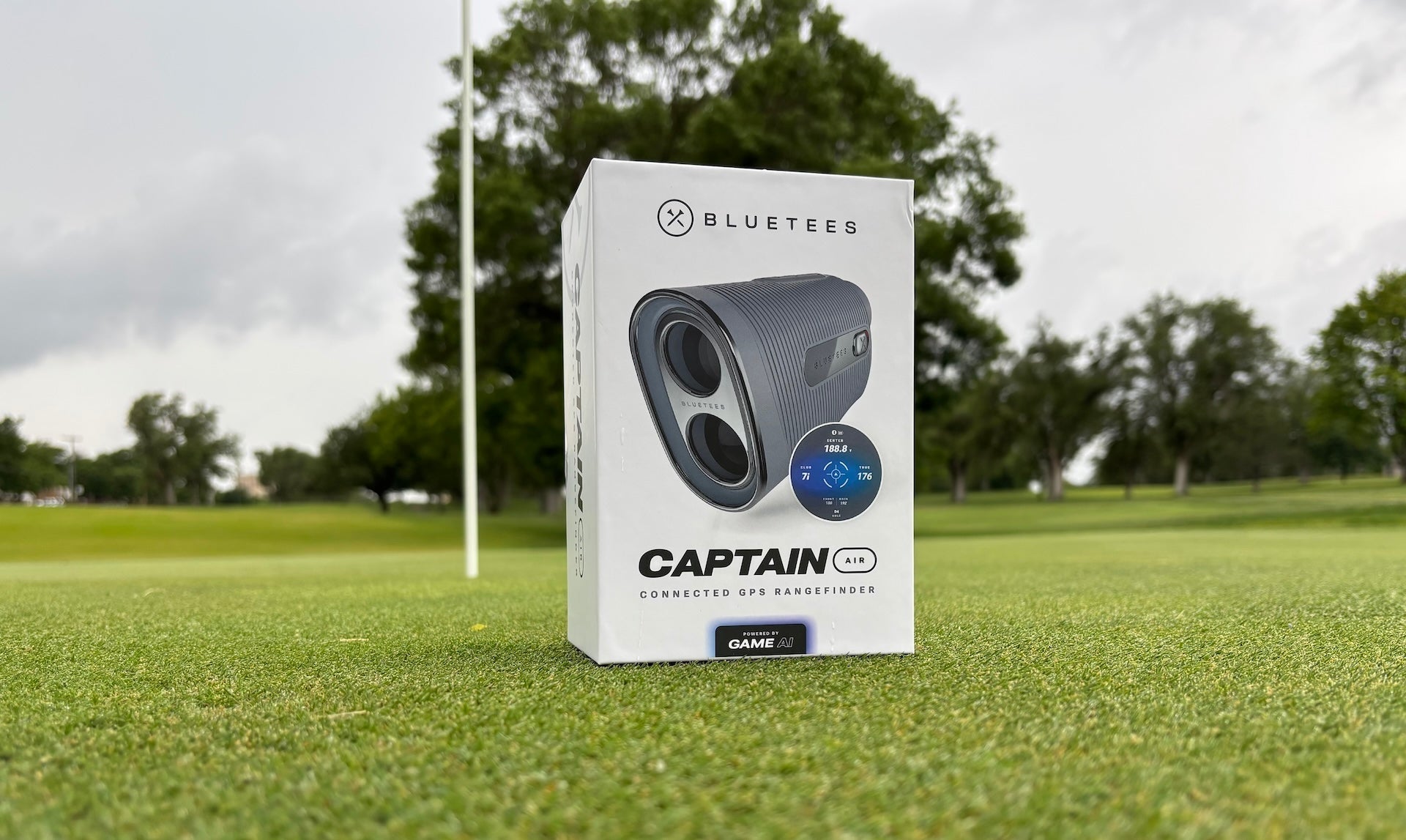 The Blue Tees Captain Air rangefinder in the box on the green near the flag in the hole