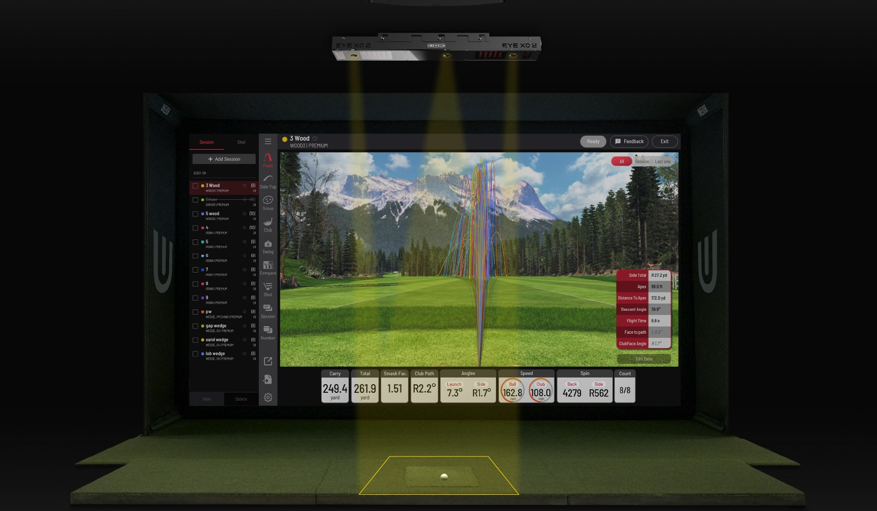 Carry distances on a virtual golf course showing on the impact screen in a Uneekor Eye X02 golf simulator