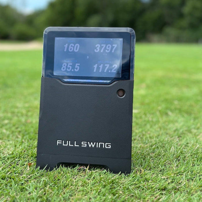 The Full Swing KIT on the grass at the golf driving range