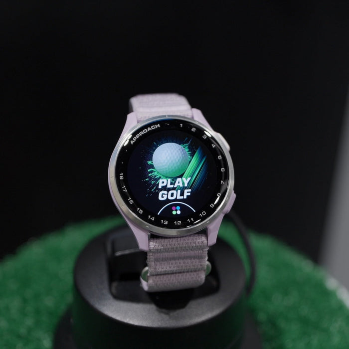 Lilac Garmin Approach J1 golf watch for juniors with Play Golf graphic on the AMOLED display