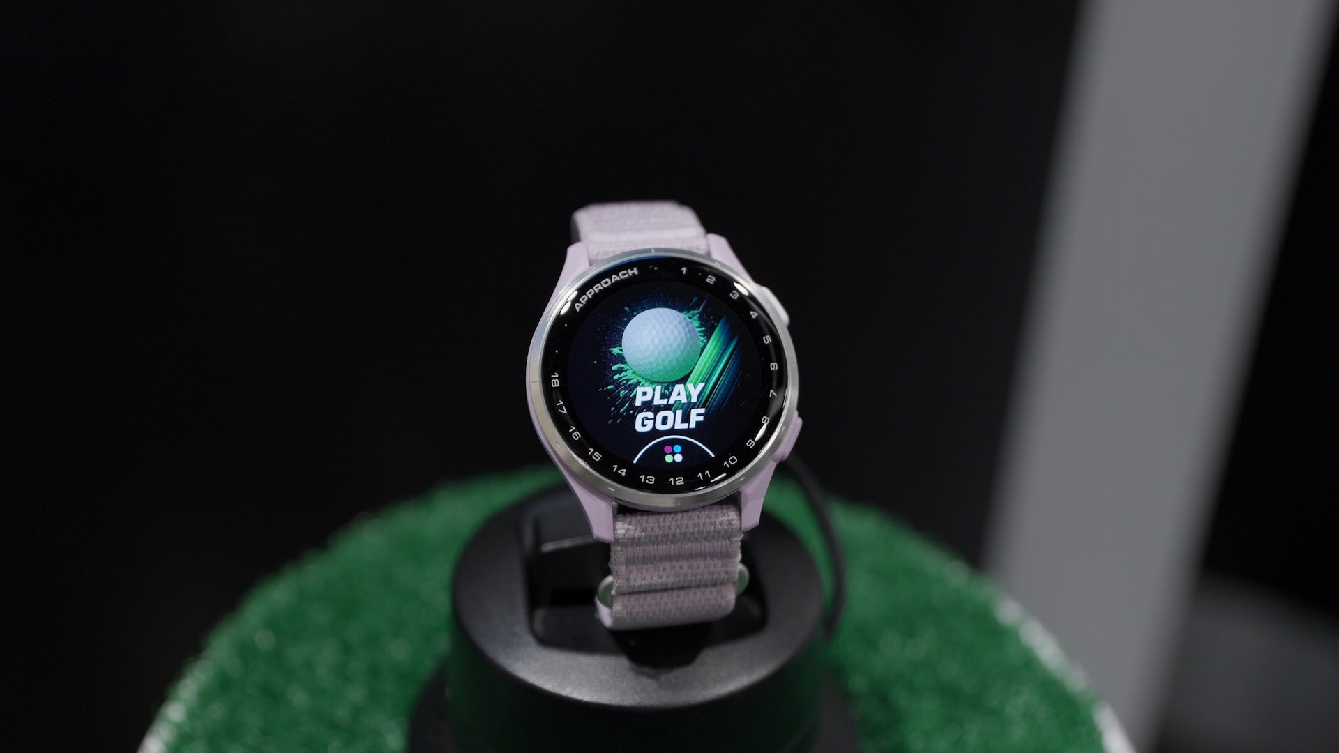 Lilac Garmin Approach J1 golf watch for juniors with Play Golf graphic on the AMOLED display