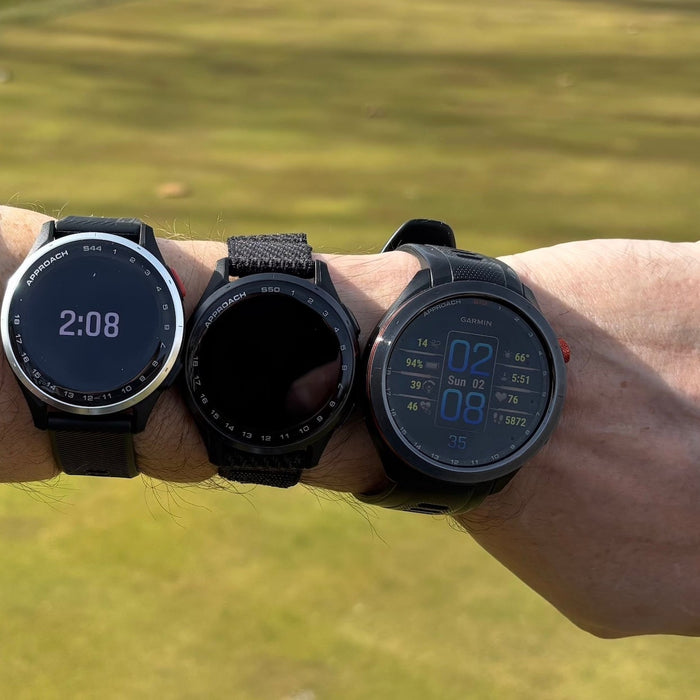 Garmin golf watches, Approach S70, S50, and S44, all on the wrist of golf reviewer Marc at the golf course