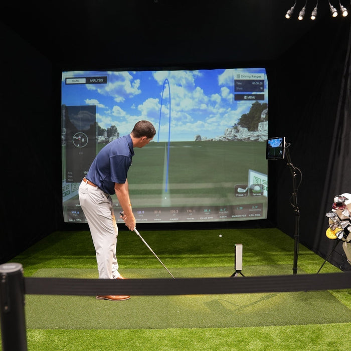 Daniel teeing up in the Square Omni golf simulator at the 2026 PGA Show