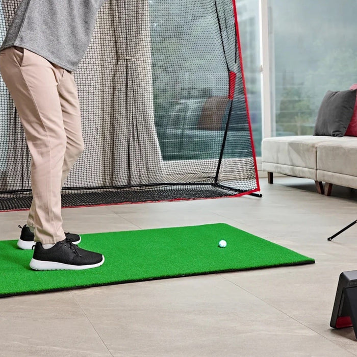 The Swing Caddie SC4 Pro in a home golf sim setup