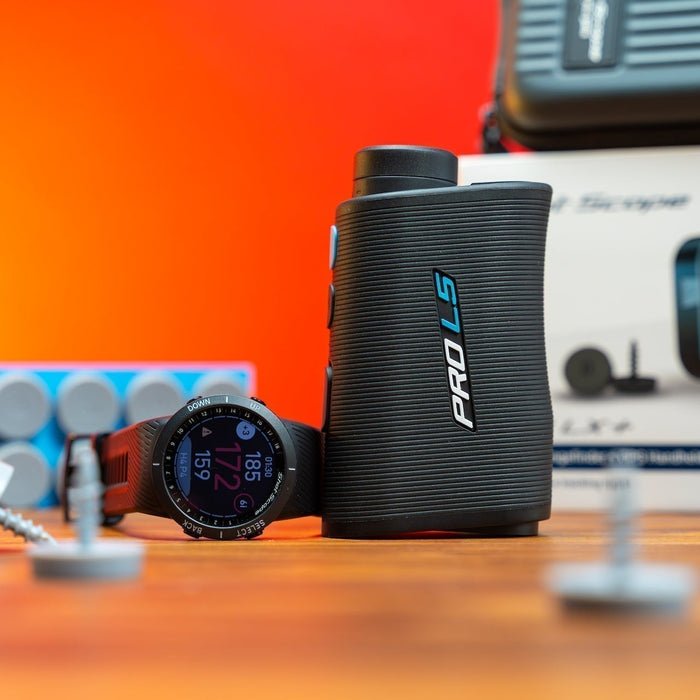 Shot Scope golf tech products on a woodgrain surface with a bright orange background