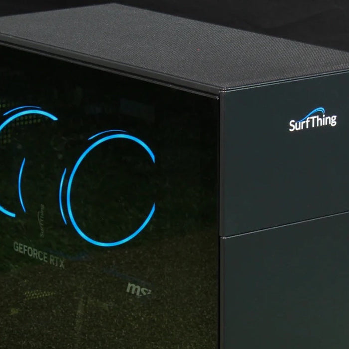 A SurfThing golf simulator computer sitting on a golf hitting mat