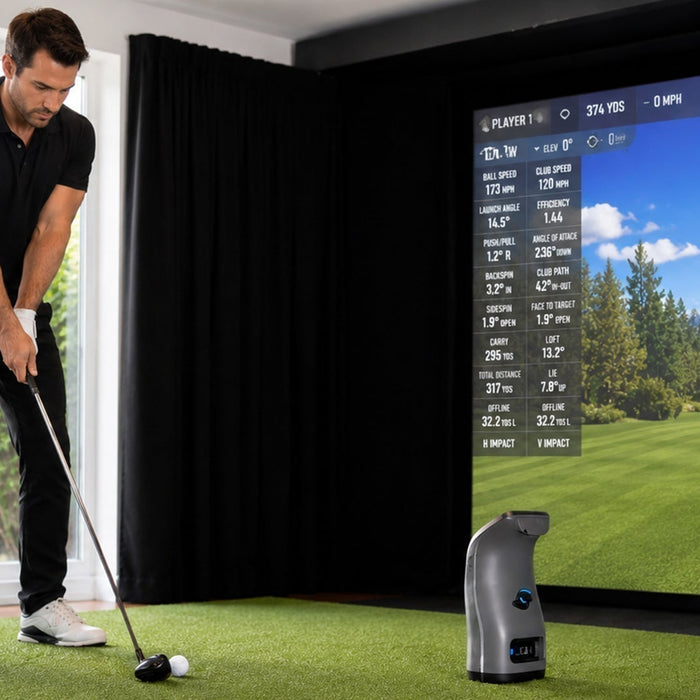 A golfer preparing to swing in a Certified Pre-Owned Foresight GC3 home golf simulator
