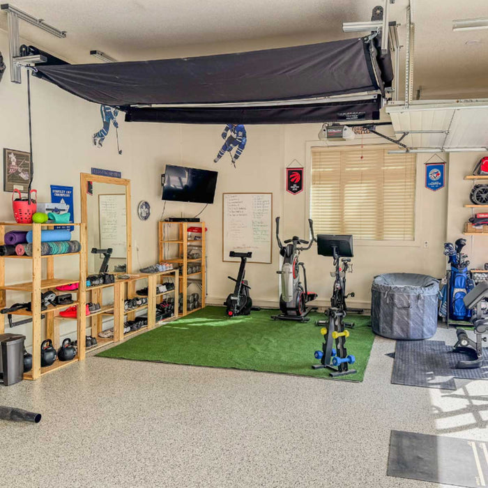 Blue Tees Golf Rainmaker SportScreen Vanish Retractable Golf Studio Complete Package | Home Golf Simulator Studio with Impact Screen, Enclosure, Hitting Mat, Putting Turf & Projector