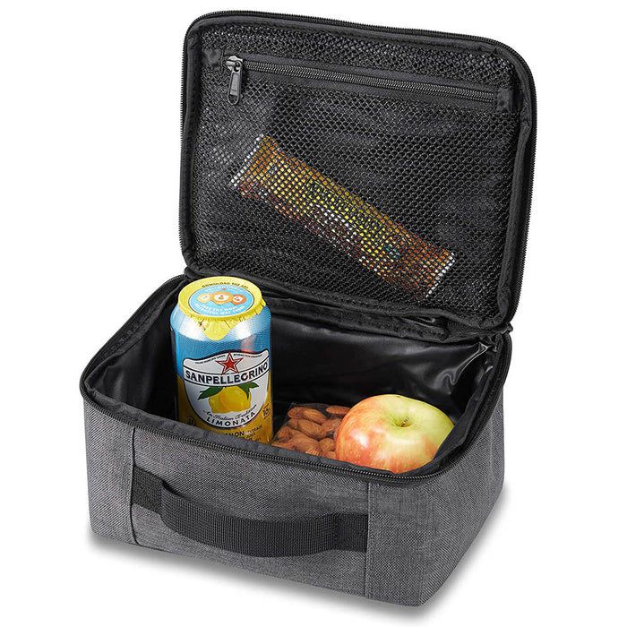 Dakine Lunch Box 5L in Carbon color with an Apple, Protein Bar, Nuts and Lemonade